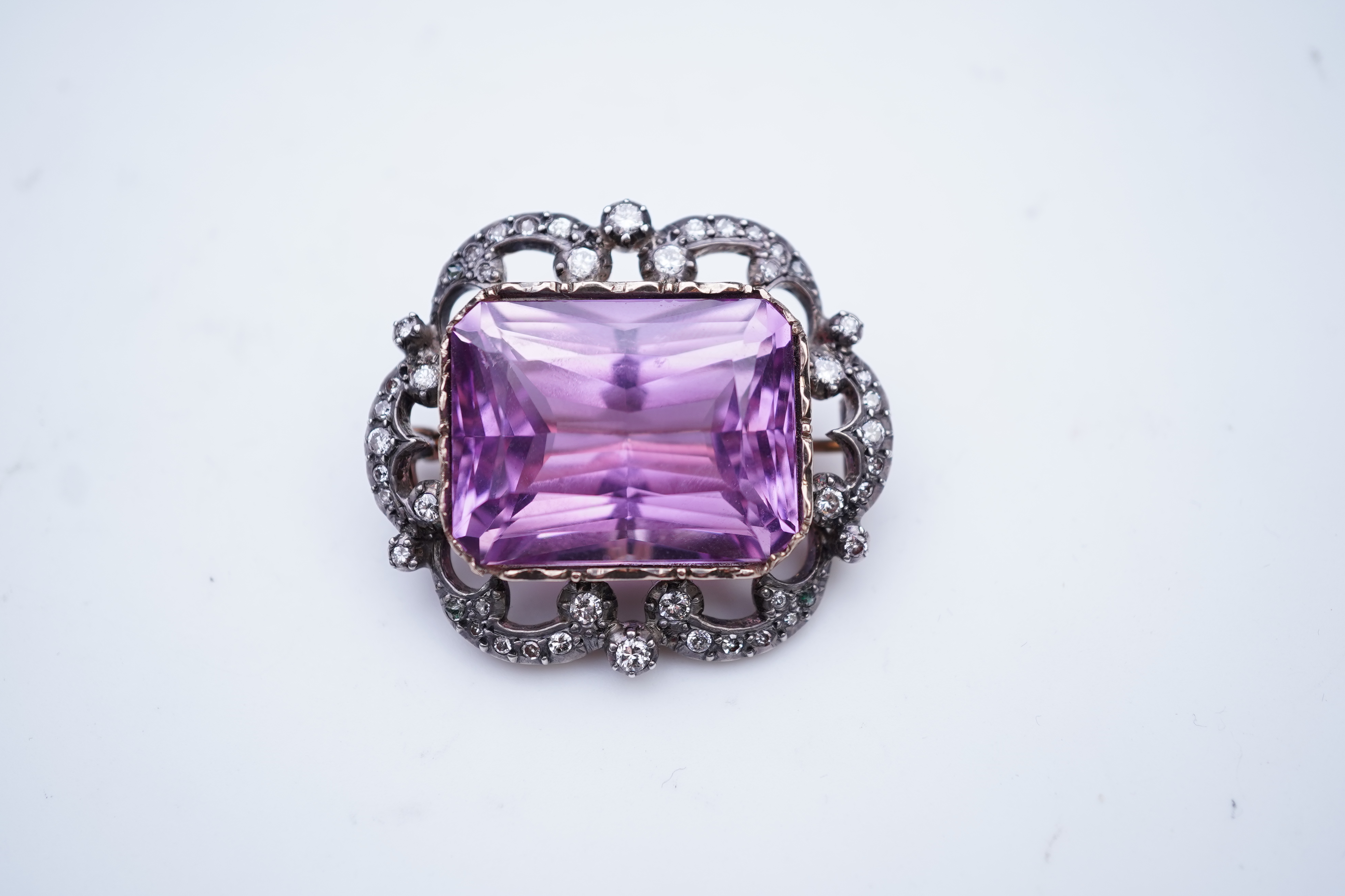 A fine kunzite and diamond brooch
